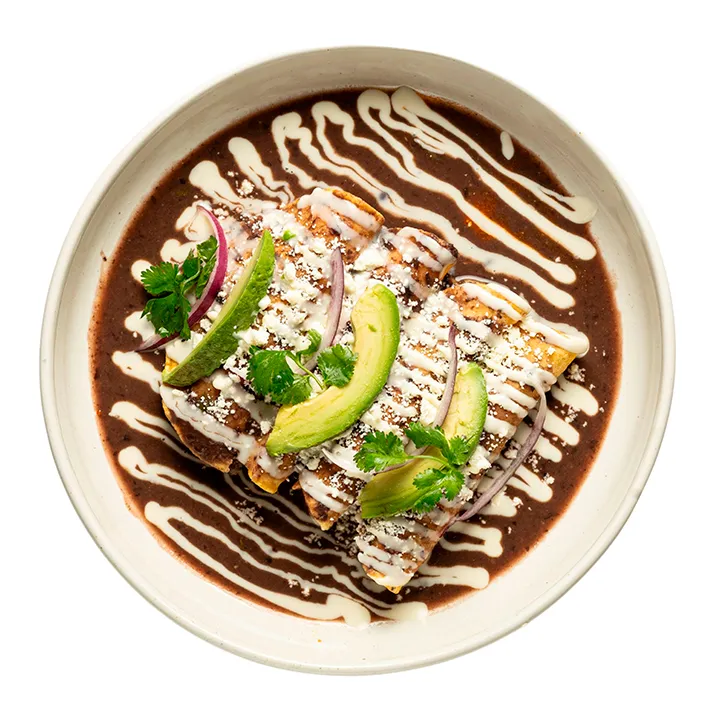 Ver foto de Enfrijoladas (Con cochinita pibil o pollo)